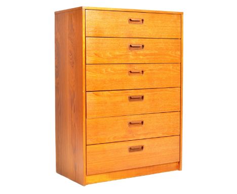 A 1970's retro vintage teak wood tallboy chest of drawers having six wide and deep drawers with recessed and lipped handles r