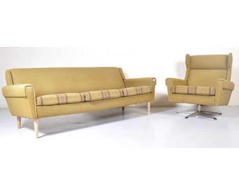 A mid 20th century retro vintage Scandinavian three seat sofa settee and matching swivel lounge chair. The settee having an a