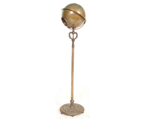 An early to mid 20th century antique vintage library pedestal terrestrial&nbsp;globe having been converted into a reading lam