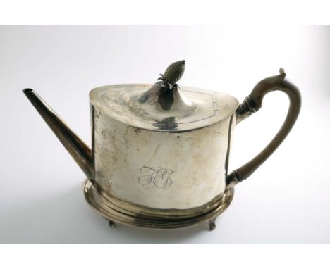 A GEORGE III PLAIN, NAVETTE-SHAPED TEA POT with a rising cover and green-stained, ivory pineapple finial, together with a mat