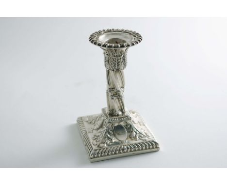 A LATE VICTORIAN DRESSING TABLE CANDLESTICK in the neo-classical taste with a wrythen cluster column, a stiff leaf capital an