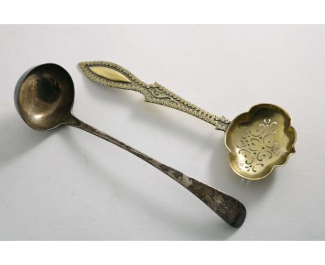 A VICTORIAN SILVERGILT SUGAR SIFTER SPOON with a shaped bowl and chased borders on the stem, by William Smith (of Liverpool),