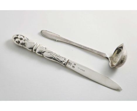 BY GEORG JENSEN:- A Danish Beaded pattern cream ladle, with English import marks for London 1931 and a Danish small knife wit