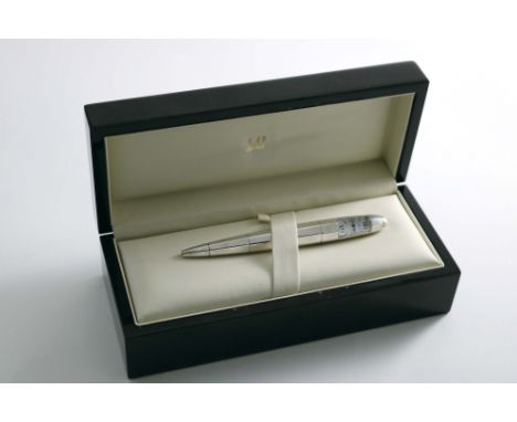 A RARE LATE 20TH CENTURY LIMITED EDITION TORPEDO BALLPOINT PEN AND TIMEPIECE COMBINED, part faceted and part round along its 