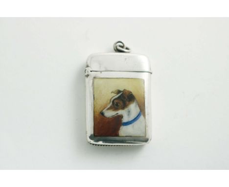 A SMALL VICTORIAN VESTA CASE of rounded rectangular form with a suspensory ring, enamelled on the front with the portrait of 