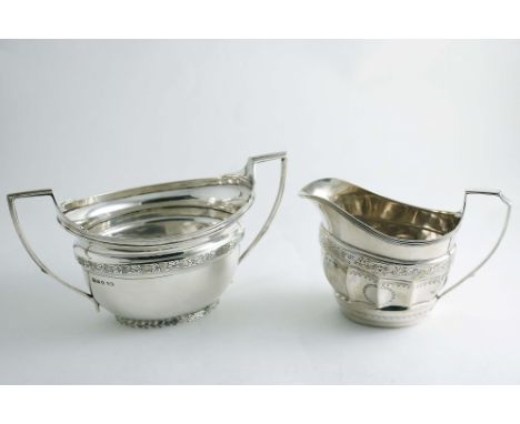 A GEORGE III TWO-HANDLED OVAL SUGAR BASIN with an engraved frieze and an engraved foot, by John Emes, London 1803 together wi