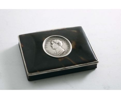 A GEORGE I MOUNTED TORTOISESHELL SNUFF BOX of rectangular outline with a stand-away hinge &amp; a reeded border, the cover in