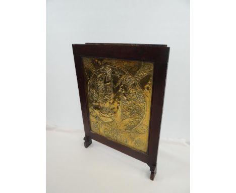 LATE 20TH CENTURY BRASS ARTS &amp; CRAFTS PANEL with repousse decoration of circular scene with figures harvesting fruit, in 