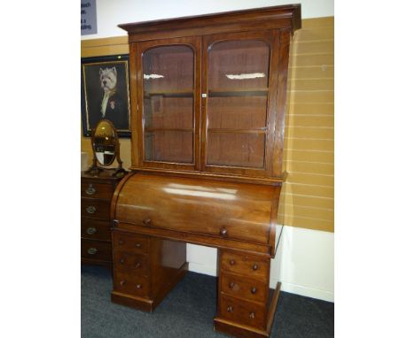 LATE-VICTORIAN MAHOGANY CYLINDER BOOKCASE BUREAU, the base with bank of six drawers to two pedestals, rotary cylinder-top rev