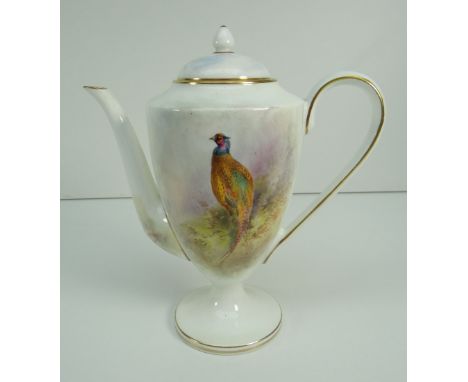 ROYAL WORCESTER PORCELAIN COFFEE POT decorated with a pheasant in foliage on a forest floor to a white ground, signed James S