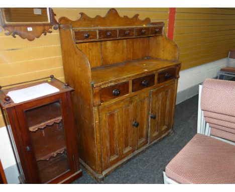 FRENCH 19TH CENTURY STAINED PINE DRESSER, the cupboard base with twin paneled doors, three middle drawers, and the rack with 
