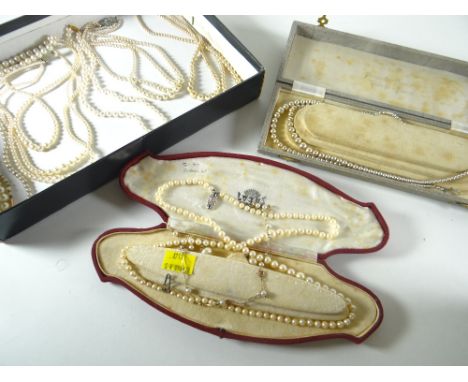 QUANTITY OF PEARL NECKLACES including examples with 9ct gold clasp, including two cases 