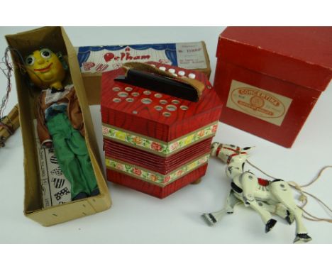 PAINTED CAST METAL ARTICULATED 'MUFFIN THE MULE' PUPPET together with a boxed Pelham puppet of Mr. Turnip and a boxed German 