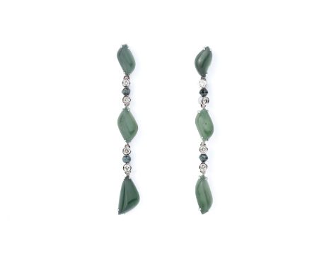 A PAIR OF JADE AND DIAMOND EARRINGS
Featuring free form jades totalling approximately 5.71 cts (each side separately marked),