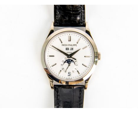 A PATEK PHILIPPE WHITE GOLD ANNUAL CALENDAR AUTOMATIC WATCH Ref. 5396G-011, circa 2011 White gold case, the silvered dial wit