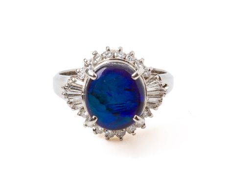 A BLACK OPAL AND DIAMOND RING
Featuring an oval black opal tab, weighing approximately 2.55 cts (marked), in platinum setting