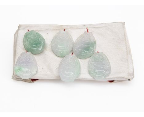 A GROUP OF CARVED JADE
Featuring a group of carved Jade to include six 'Mi-Le' pendants, and two other carved pendants
(8 tot