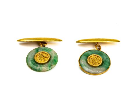 A PAIR OF JADE CUFFLINKS
Featuring a pair of Jade cufflinks, with 'Fu' and 'Shou' symbols, mounted on a yellow gold setting w