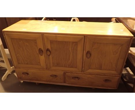 Ercol light wood sideboard with two drawers and two under cupboards