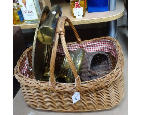 A wicker basket containing an Eastern pot, a desk lamp etc 
