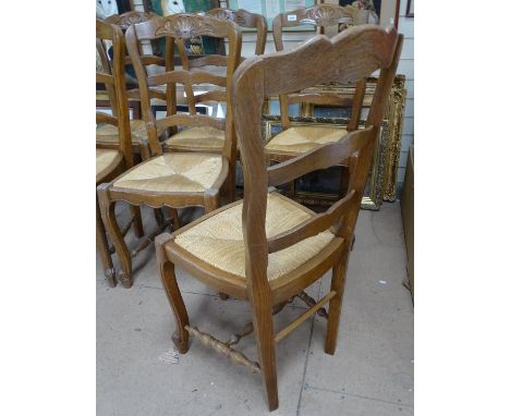 A set of 6 French oak ladder-back dining chairs 