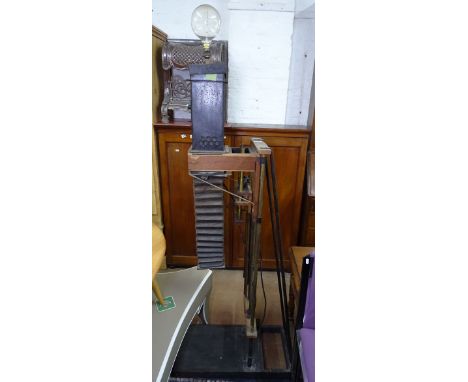 An unusual standard lamp in the form of a photographic enlarger 