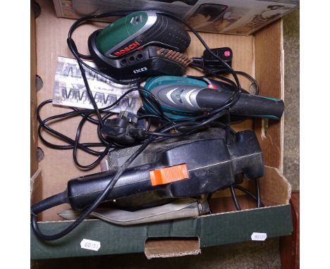 A Black &amp; Decker wallpaper stripper, a tile cutter, and sander 