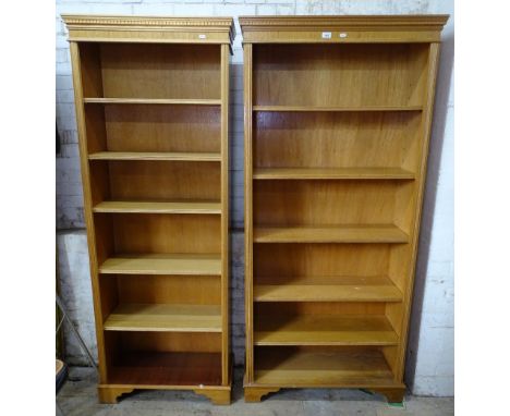 A pair of modern oak floor standing open bookcases, with adjustable shelves, W89cm, H196cm, shelf depth 27cm 