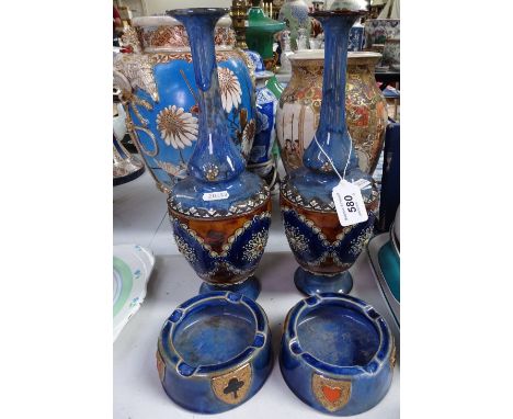 A pair of Royal Doulton tube lined vases, 12.25", and a pair of Doulton ashtrays with playing card motifs 