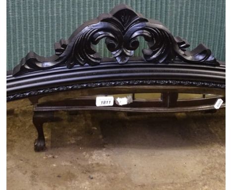 A modern painted arch-top over mantel mirror 