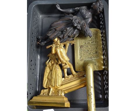 A spelter figure, 2 brass figures, and an Oriental trowel 