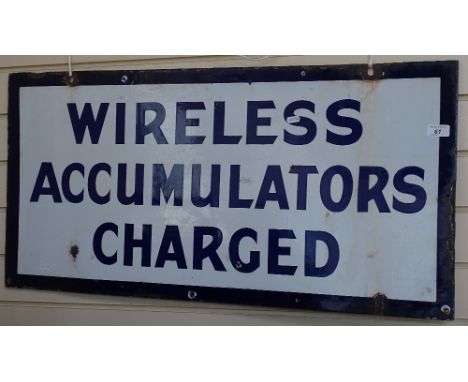 An Antique double-sided enamel sign "Wireless Accumulators Charged", length 3' approx 