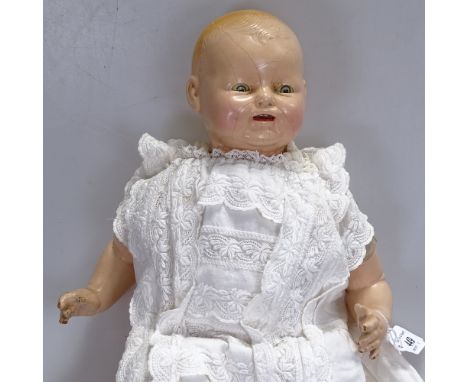 An American composition Vintage doll, marked EIH.co.inc, 16" 