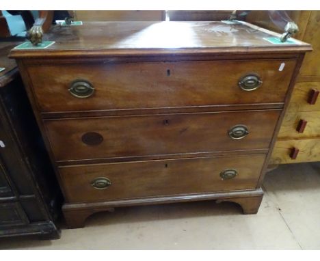 A George III mahogany chest with a satinwood-strung cross-banded top, 3 long drawers, on bracket feet, W90cm 