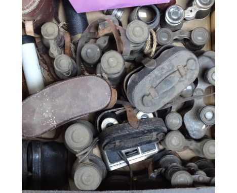 A boxful of Vintage binoculars 
