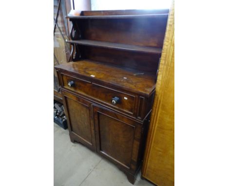 A Regency mahogany chiffoniere, with raised shelf back, single frieze drawer, cupboards under, on bracket feet, W100cm 