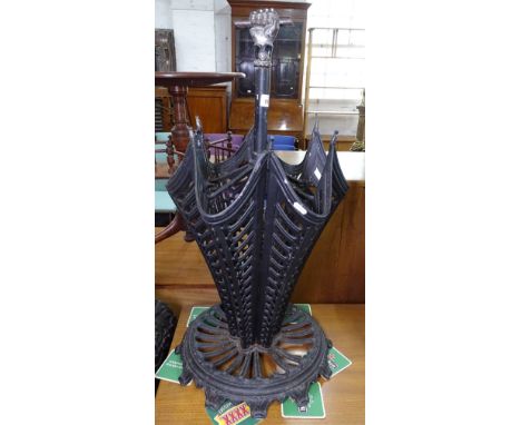 A cast-iron umbrella design stick stand, H76cm 