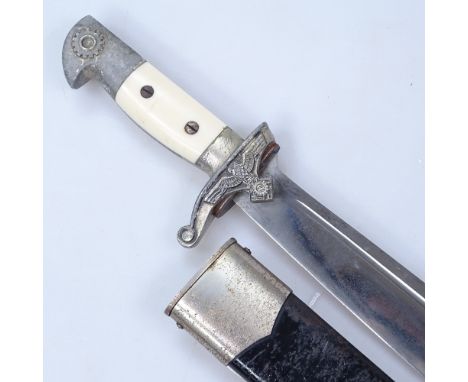 A rare and original Teno Mans Hewer maker Eickhorn blade and scabbard, with matching numbers 2762 Eickhorn trademark on blade