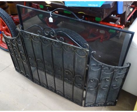 A wrought-iron and mesh-panelled 3-fold firescreen, and a cat and mouse design mesh firescreen (2) 