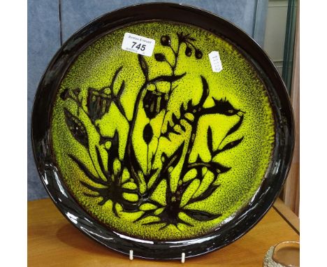 A Poole Pottery Aegean pattern charger with wild flower design, 12.5" 