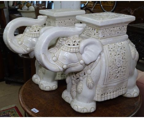 A pair of glazed ceramic elephant jardiniere stands, H43cm 