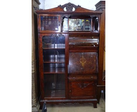 A late Victorian mahogany side cabinet, with fitted glazed cupboards, and drawers, raised on bracket feet, W113cm 