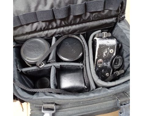 A Canon camera and 4 lenses, plus various accessories 