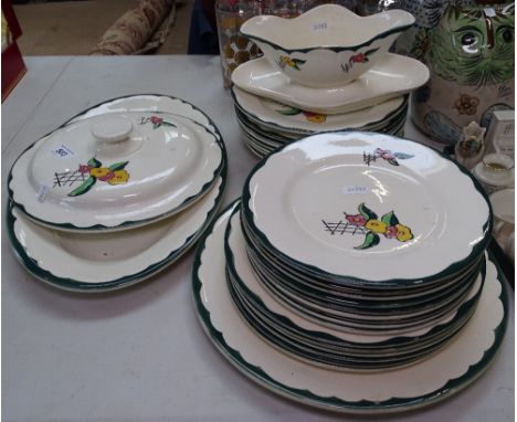 Vintage French painted dinnerware "Le Reve" with floral motifs 