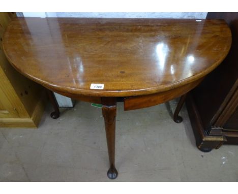 An 18th century mahogany D-end console table, with single drop leaf, raised on cabriole legs, with 2 triangular frieze drawer