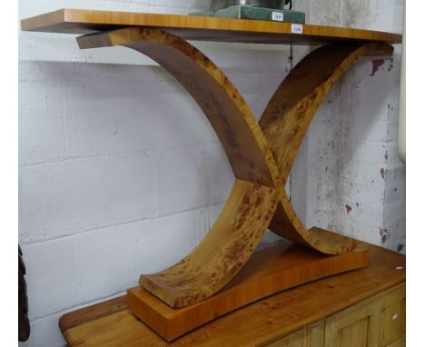 A contemporary craftsman made console table in burr elm and cherry, on X-shaped supports, W121cm 