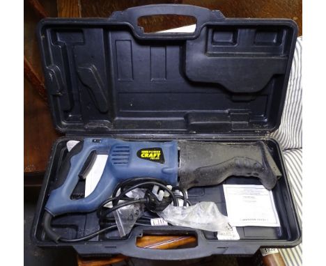 6 boxed power tools, to include paint roller, sabre saw, sander etc 