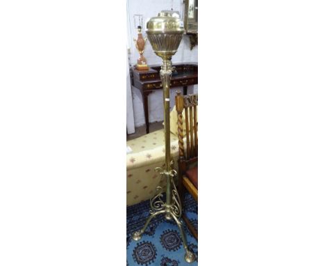 An Art Nouveau brass floor standing oil lamp, H138cm 
