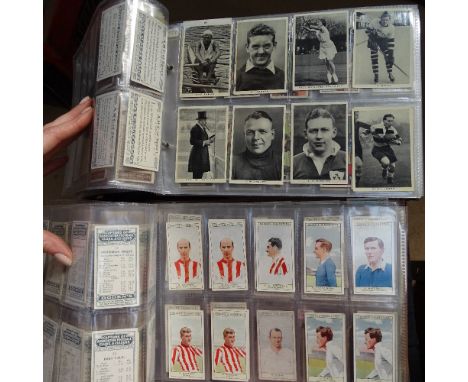 2 albums of sports related Vintage cigarette cards 