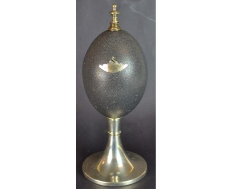 A Mounted Emu Egg with Engraved Silver Swan &  - W.A. Plaque - Silver plated stand; base marked ‘S&B’ & ‘EPNS’ - Height: 25.2